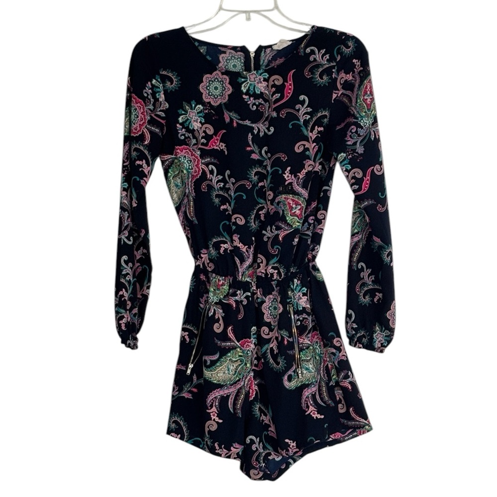One clothing floral romper, size S with zip-up pockets and closure in the back